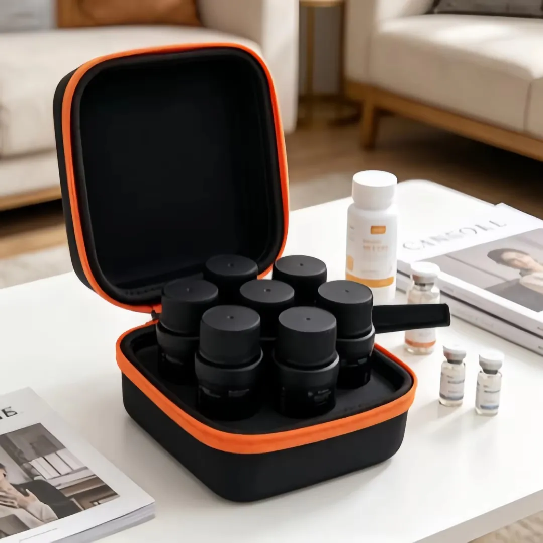 Orange 7-compartment peptide storage box opened on desk with bottles